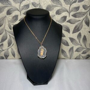 Necklace with chalcedony pendant and 18k gold plated chain.